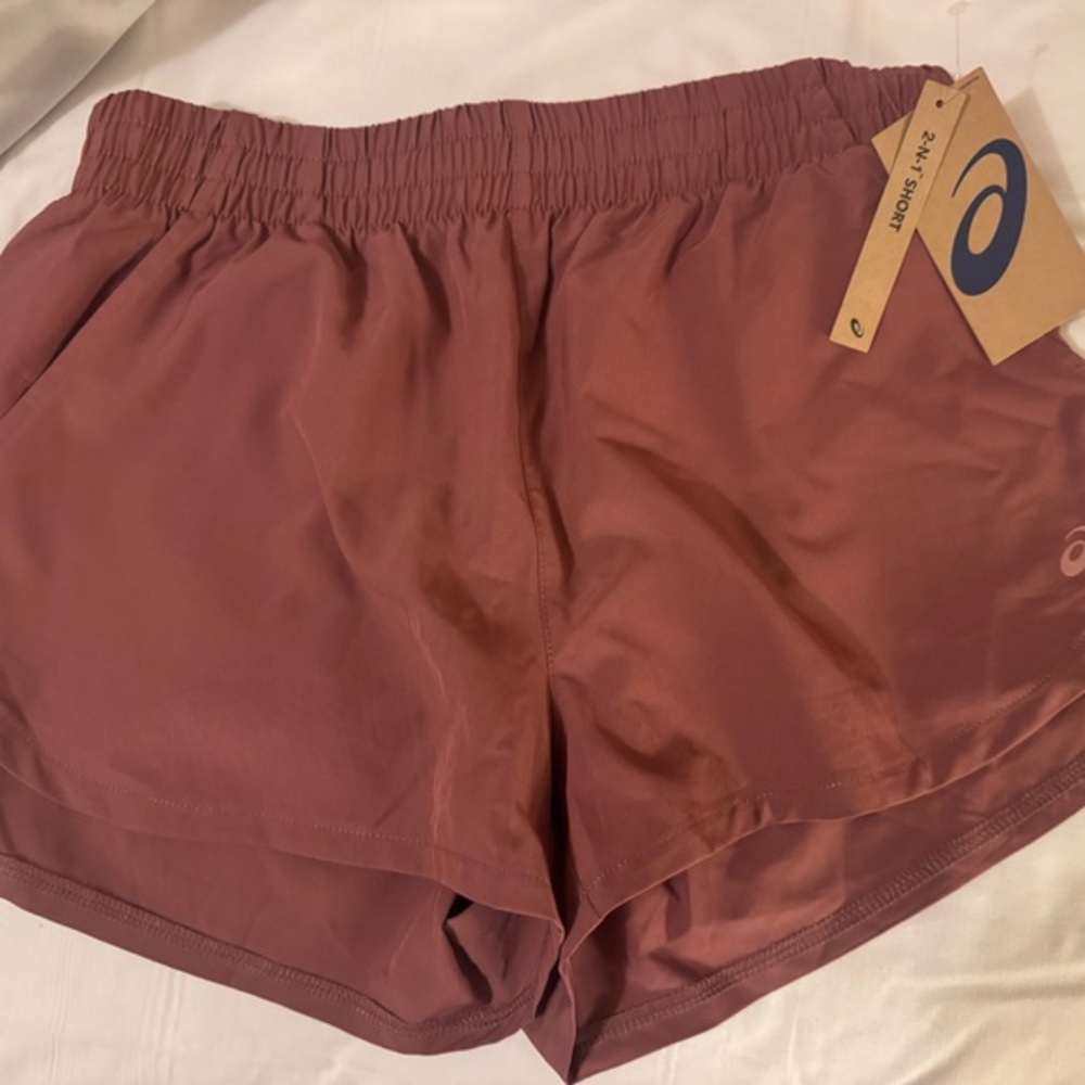 Women's 2 in 1 shorts by ASICS cute comfy and practical! See pic for details😊